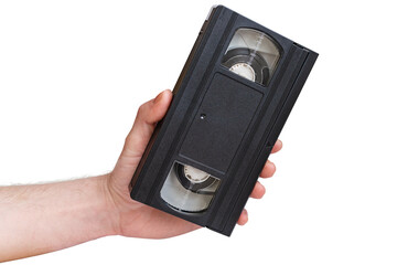 Vintage VHS cassette in hand. A man's hand holds a video cassette on a white background.