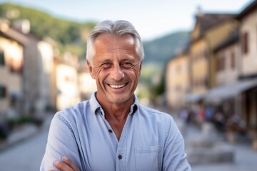 Medium shot portrait photography of a satisfied mature man wearing a casual short-sleeve shirt against a quaint european village background. With generative AI technology