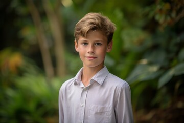 Fototapeta premium Close-up portrait photography of a satisfied mature boy wearing an elegant long-sleeve shirt against a lush tropical jungle background. With generative AI technology