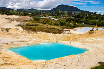 Fototapeta premium Open foundation kaolin mine - Extraction of white mud and clay