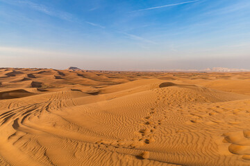 Fototapeta na wymiar The Empty Quarter, or Rub al Khali - The world's largest sand desert in Dubai.
