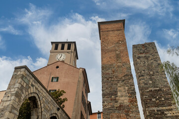 Low angle view of the medieval towers of Savona: the Brandale Tower, also called &ldquo;Campanassa&rdquo;, and the lower Riario and Corsi Towers (12th century), Savona, Liguria, Italy