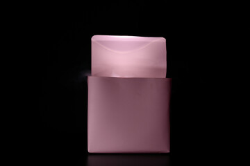 Camera flash in box on black background