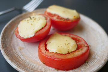 Tomatoes stuffed with cheese from the oven