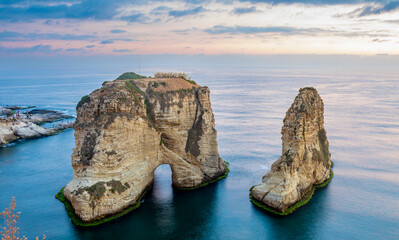 Raouche or pigeons rocks sea panorama in a sunset time, Beirut, Lebanon - obrazy, fototapety, plakaty