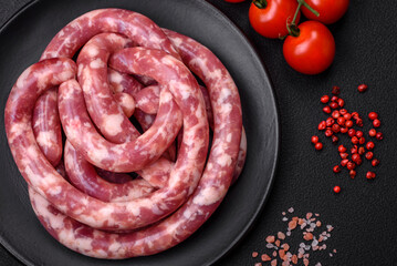 Raw sausages from pork or beef with salt, spices and herbs