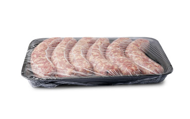 Packed raw sausages on white background