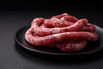 Raw sausages from pork or beef with salt, spices and herbs