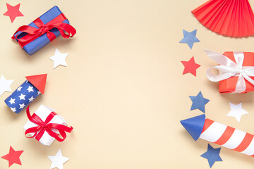 Gift boxes with firework rockets and fan on pale yellow background. American Independence Day