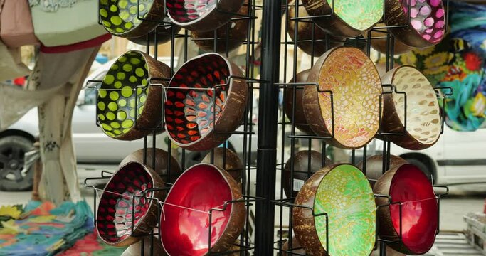 Bright colorful original bowls of vibrant colors outdoors in local market stall in Marsaxlokk of Malta
