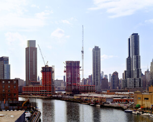 New York City skyscrapers and Hudson River in Manhattan, USA, construction 