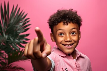 Close-up portrait photography of a joyful boy in his 30s making a no or stop gesture with the extended palm against a hot pink background. With generative AI technology