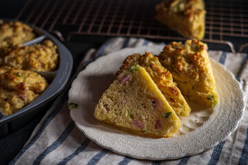 Ham-and-cheese scones with canadian bacon, cheddar cheese, and scallions.