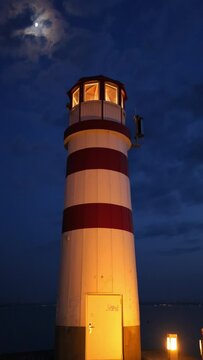 Lighthouse at Lake Neusiedl at Night Vertical Video