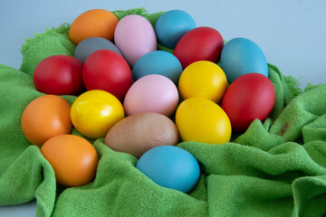 eggs painted in different colors to celebrate Easte