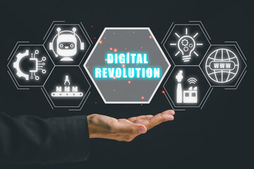 Digital revolution concept, Business person hand holding digital revolution icon on virtual screen.