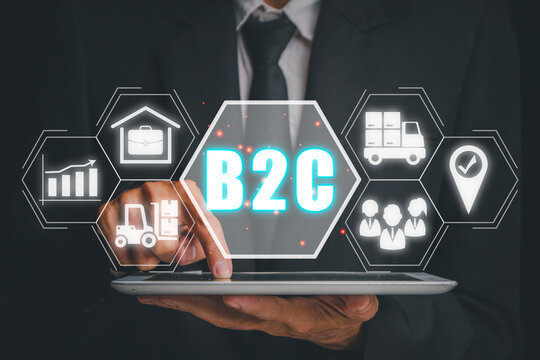 B2C, business to customer concept, Businees person using tablet with business to customer icon on virtual screen.
