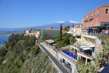 Mount Etna and he Charming Medieval hilltop town of Taormina Sicily.  Sicily's legendary resort...