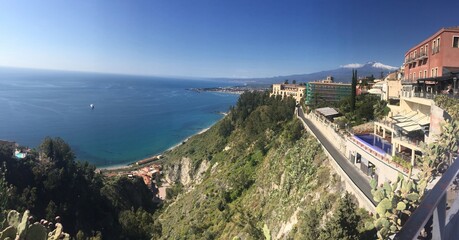 Mount Etna and he Charming Medieval hilltop town of Taormina Sicily.  Sicily's legendary resort...