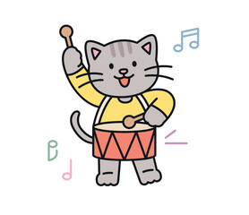 Cute cat. A gray cat is happily playing the snare drum.