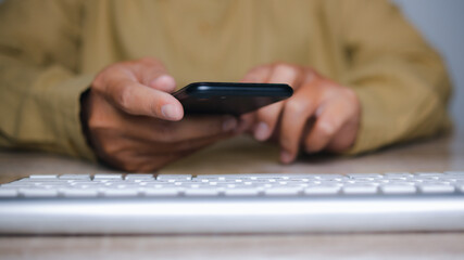 Man hand using mobile smartphone. copy space.