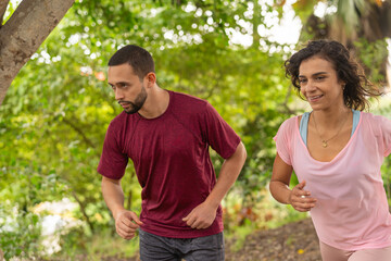 Obraz premium Couple in sportswear doing a run