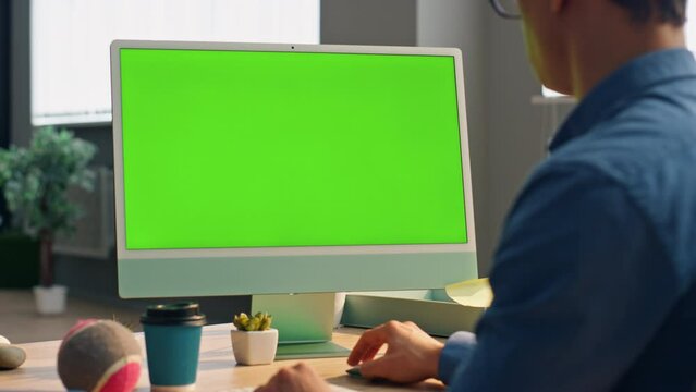 Smart startuper working mockup computer in office closeup. Man staring monitor