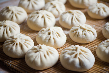 Homemade  raw steamed buns. Delicious baozi,