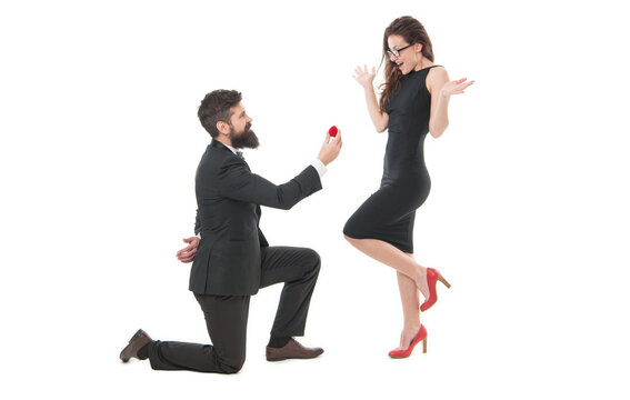 Now they feel happy. i said yes. happy valentines day. tuxedo couple formal event. couple in love celebrate engagement. wedding party time. man on one knee making marriage proposal. Will you marry me - Powered by Adobe