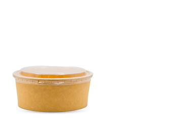 Disposable brown paper salad bowl with clear plastic lid isolated on white background with clipping path.