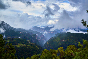 beautiful canyon with mist and amazing clouds, forest in summer, mexiquillo durango 