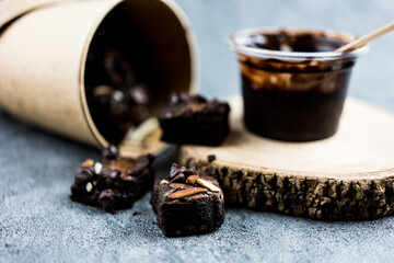 Small sweet topping with chocolate chips and slice almonds. Close up