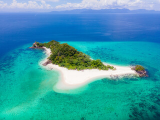 Khai Island from drone corner, Satun, Southern Thailand Known for its clear waters, white sandy beaches and beautiful coral reefs. Green sea before reaching Koh Lipe, Andaman Sea