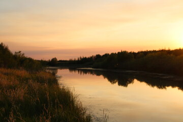 Fototapeta na wymiar Sunset Colors On The Lake, Pylypow Wetlands, Edmonton, Alberta