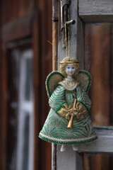 a figure of angel on old door handle