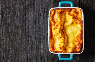 Fototapeta na wymiar lasagne al forno, italian beef lasagna, top view