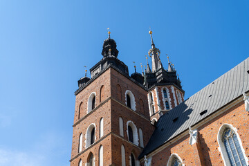 St. Mary's Basilica at the Main Market Square in the Old Town district of Krakow, Poland. Bazylika Mariacka Kraków, Kościół Mariacki church in Cracow.