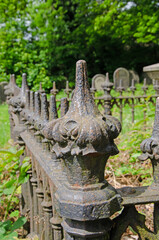 Weathered metal fence finials
