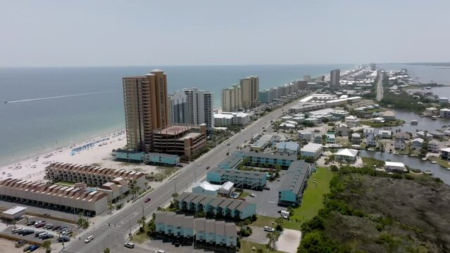 Gulf Shores, Alabama skyline and beach with drone video moving in.