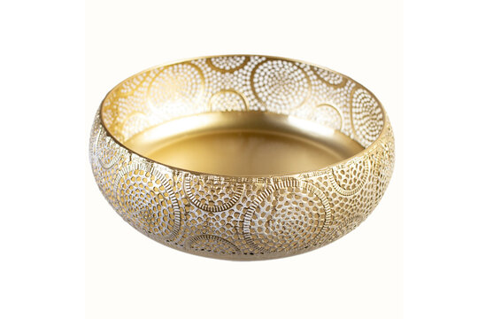 Engraved golden bowl, isolated on white, aoft focus