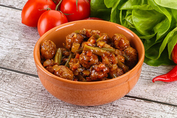 Meatball with vegetables and spices