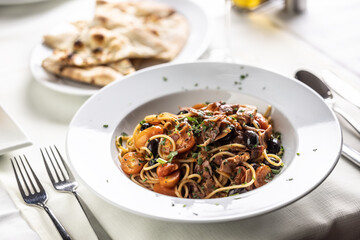 Al amatriciana. with tomatoes and pancetta, a spicy Italian food