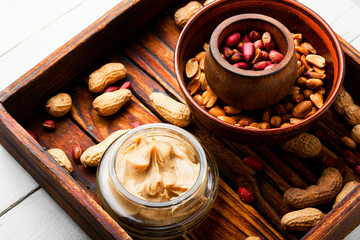 Homemade peanut butter and heap of nuts
