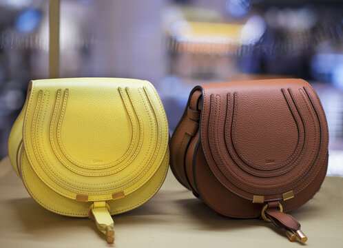 Marcie bag in yellow or brown leather, lock  with the characteristic ring by Chloe.Milan - Italy,18 May 2023