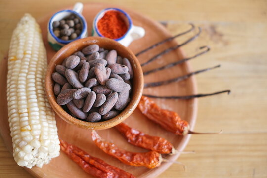 Mayan ancient chocolate ingredients on a clay plate