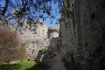 Fototapeta na wymiar Enormous ancient walls of Rhodes. Medieval city in Rhodes town, Greece