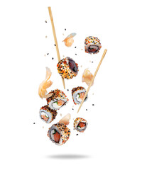Delicious fresh sushi rolls with ginger in the air isolated on white background