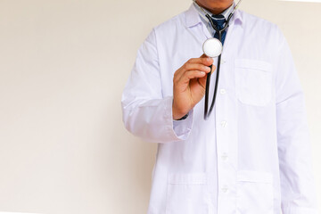 Doctor in lab coat on white background