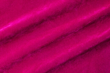 Pink velvet fabric texture used as background. pink fabric background of soft and smooth textile material. There is space for text..