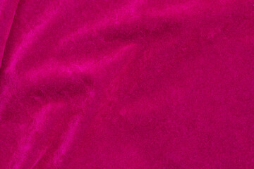 Fototapeta na wymiar Pink velvet fabric texture used as background. pink fabric background of soft and smooth textile material. There is space for text..